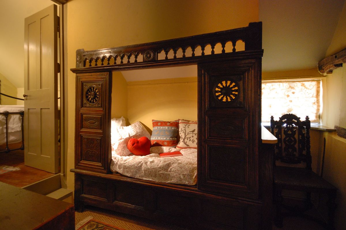 An antique Breton Bed at Laundry Cottage