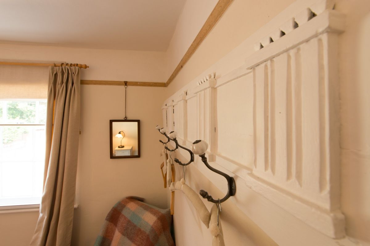 Romantic bedroom with coat hangers