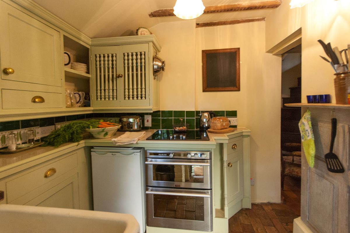 Practical gallery kitchen at Cissy's Cottage