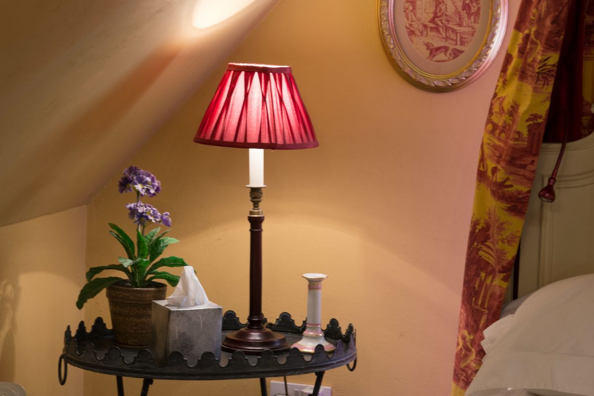bedside lamp in a romantic cottage