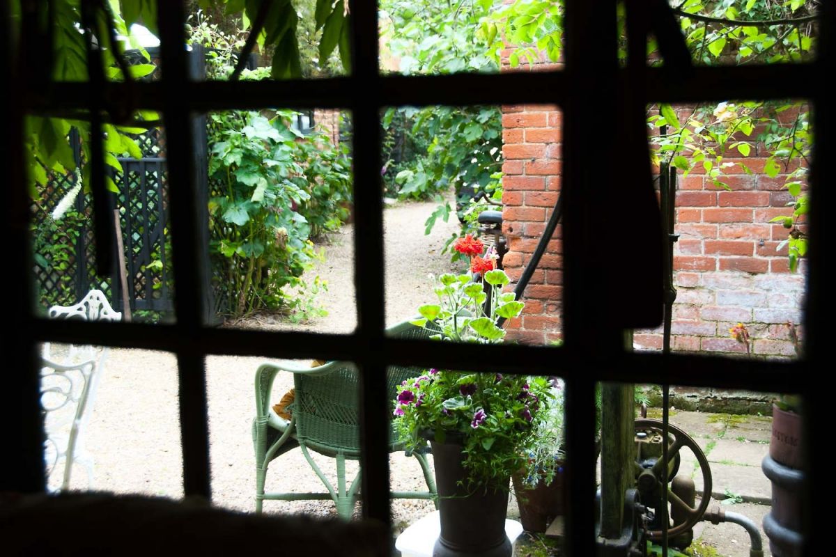 Window through to the Courtyard of Cissy's