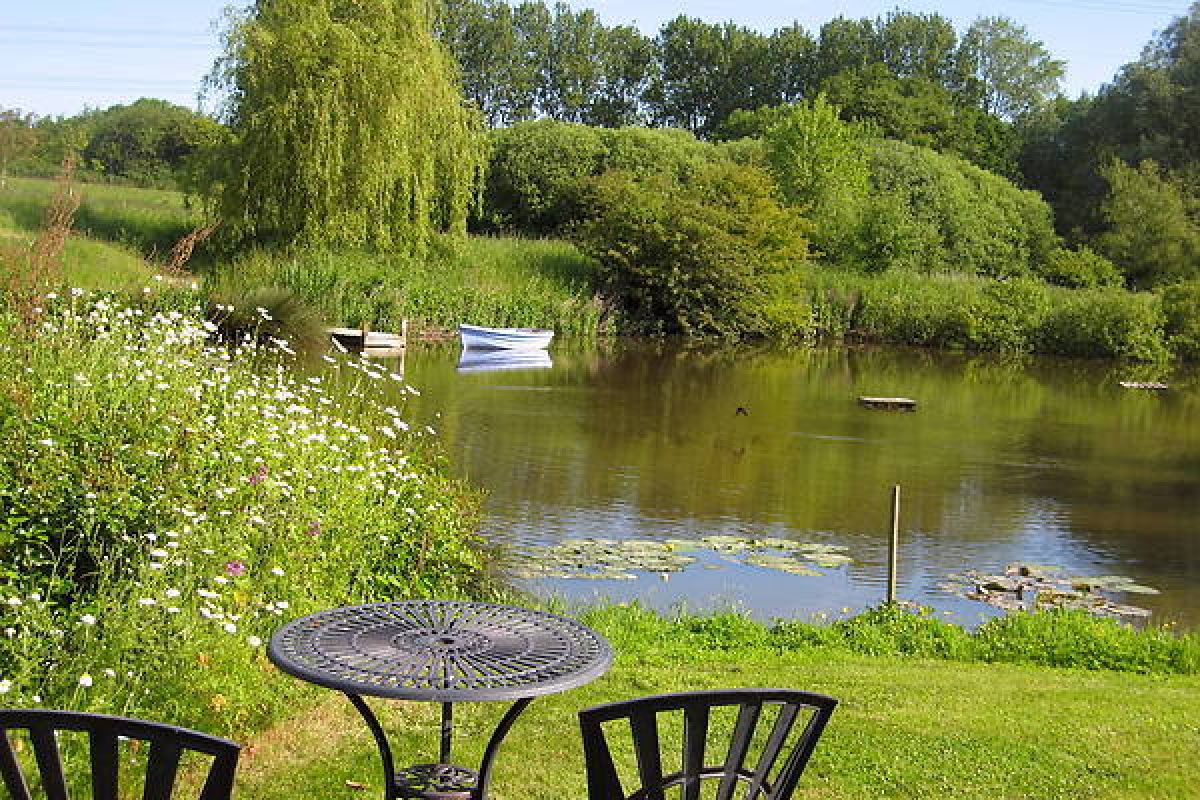 Mill Cottage pond with boat
