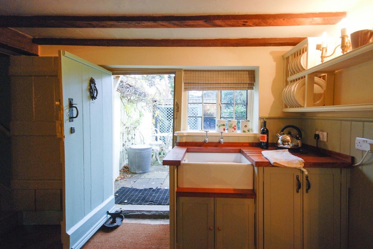 romantic Suffolk farmhouse style kitchen with beams